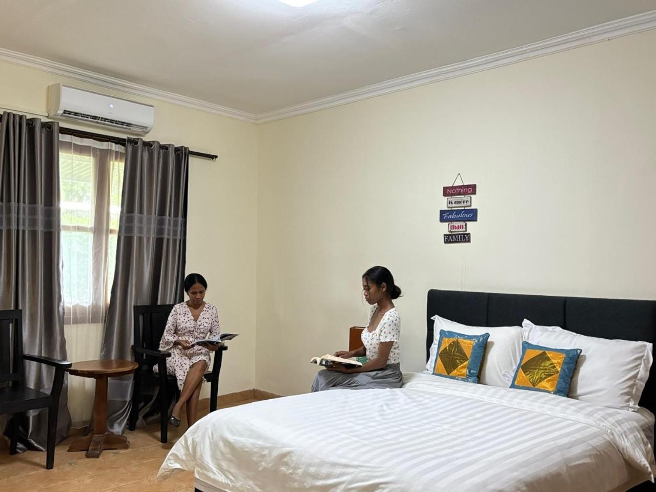 Palm Malinamoc Hotel Dili Exterior photo