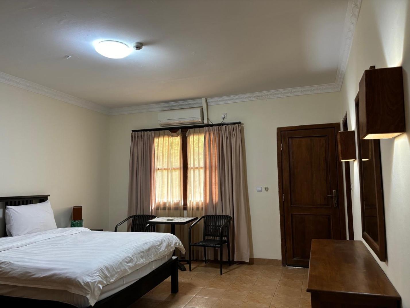 Palm Malinamoc Hotel Dili Exterior photo